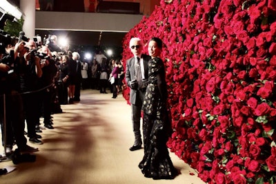For the Museum of Modern Art’s film benefit on November 15 in New York, the celebrity arrivals backdrop wasn’t a step-and-repeat of logos but rather a wall of 20,000 fresh crimson-colored roses.