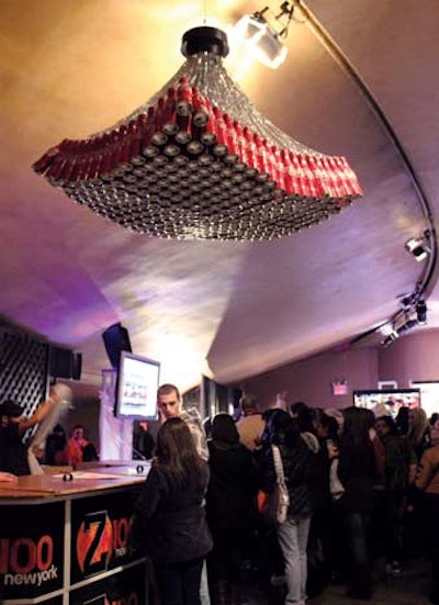 To add some branding to the Z100 & Coca-Cola All-Access Lounge at the Hammerstein Ballroom in New York in December, sponsor Coca-Cola fashioned a chandelier from aluminum bottles.