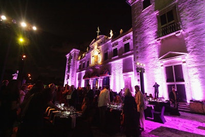 The facade of the museum was bathed in alternating shades of LED lighting, setting a dramatic background for dinner.