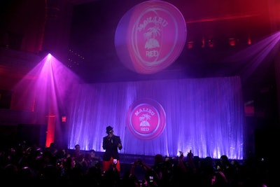 In red pants and his signature fedora, Ne-Yo entertained the crowd at the launch with a performance that included songs 'Miss Independent' and 'Closer.'