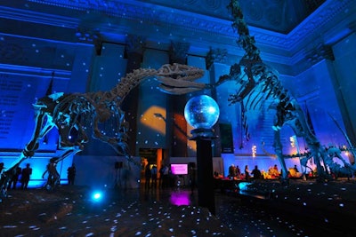 The scientific institution's Theodore Roosevelt Rotunda served as the reception space for the March 8 affair. Levy Lighting used LED lighting and a disco ball to create a shimmering effect that referenced the night's theme and the museum's upcoming bioluminescent exhibition.