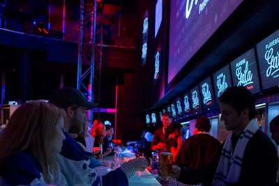 Fans had to wear whatever items they wanted autographed. They could also purchase hard hats, a symbol of the Team Up Foundation's progress, for players to sign. The many screens at Real Sports Bar and Grill displayed the gala's marketing imagery.