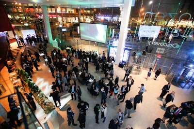 Discovery used Alice Tully Hall for the receptions held before and after the screening, taking advantage of the open-plan space. Gray couches stood in the front, providing guests with some seating, while the food and drinks stations were located in the rear.