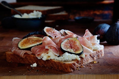 Ricotta, figs, prosciutto, and wild flower honey fill the Fig and Prosciutto sandwich.