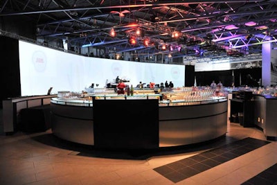 The sales desk on the showroom floor became the bar in the dining room. The screen was 100 feet long and 16 feet high.