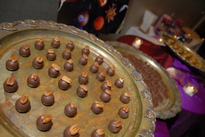 The table held offerings from the chocolate company's Exotic Truffles collection, which combines chocolates with ingredients such as Chinese star anise, candied violet flower, and New Mexican pecan.