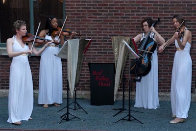 During the alfresco cocktail reception, the Red Riding Hood quartet played songs such as 'Somewhere' from West Side Story.