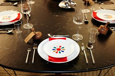 The table settings at the Herman Miller space had a retro 1950s look. Place cards were attached to wooden tops with twine.