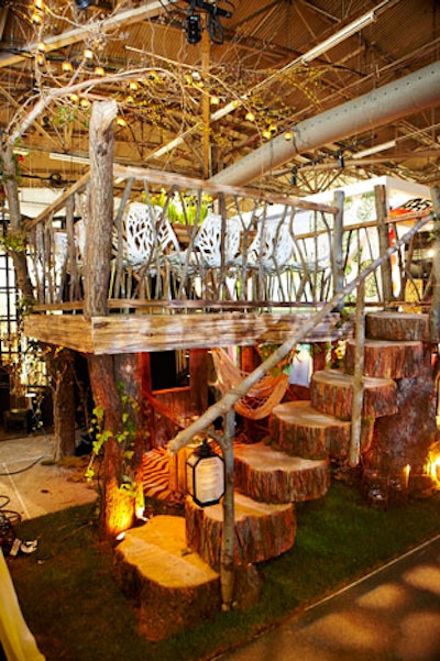 One of the more ambitious installations was the two-story tree house that Evette Rios designed for hayneedle.com. Constructed by John Zukowski of C&C Design Construction Group, large tree trunks functioned as steps leading up to the table. An alcove with a hammock and a grass-covered floor was tucked underneath the structure.