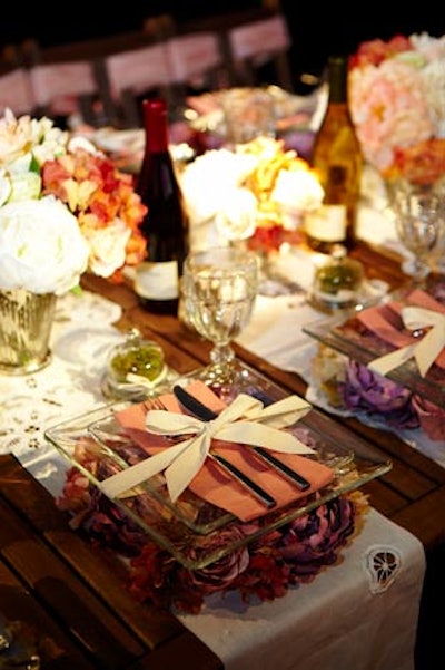 The clear glass plates at New York University's shabby-chic table sat atop beds of fabric roses.