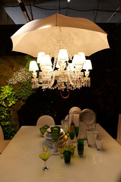 The focus of Domus Design Collection’s installation for The New York Times was a giant, living wall of textured greenery. Also cool: a Waterford Crystal chandelier intertwined with an umbrella hung above the table.