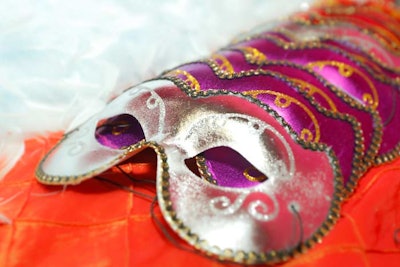 An accessories tent on the second floor held costumes, masks, boas, hats, bindis, and other accoutrements for guests to wear.