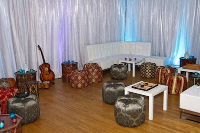 Drapes, lounge furniture, bongos, backgammon, and chess dressed up a lounge setup in the rear of the ballroom.