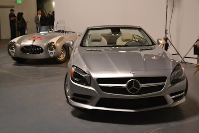 The 2013 Mercedes SL Roadster stood prominently beside a replica of the original 1952 SL at the entrance to the 'SL at Hollywood' exhibit. As the new model was just making its debut and has yet to appear in films, the event's producers kept the vignette simple, incorporating just a few director's chairs.