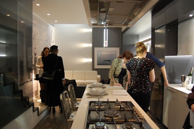 Guests explored the model kitchen and living room.