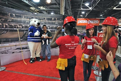 Rogers sponsored Family Day on Friday, March 16, which provided free entry for children. Kids could take photos with mascots like the Maple Leaf's Carlton Bear, while Rogers staffers wore hard hats and utility belts.