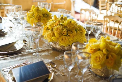 The floral arrangements from Amaryllis Inc. featured yellow flowers exclusively, a nod toward the 'Golden Gala' theme.