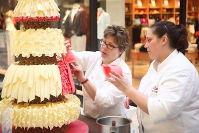 Laurie Alleman Weber, chef and owner of the Swiss Bakery, won the judges' prize and the popular vote for her 'High Volume'-themed cake.