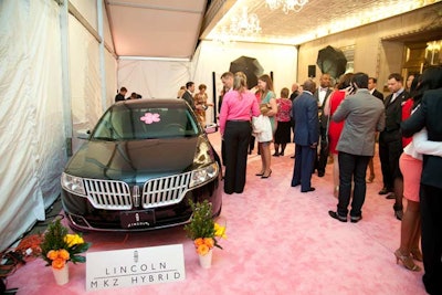 Each guest received a key upon entering the Lincoln Lounge. They took turns attempting to start the engine of a Lincoln MKZ Hybrid and win dinner for 10 at Ris.