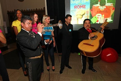 The band Mariachi Morelos band played 'Happy Birthday,' as staffers wheeled the cake out to the center of the reception.