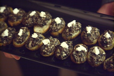 At Saturday evening's V.I.P. reception at Saks Fifth Avenue, 100 guests snacked on appetizers like mushroom toasts with goat cheese.