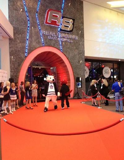 Team dancers and mascots like Carlton Bear and the Raptor greeted guests at the red carpet entrance.