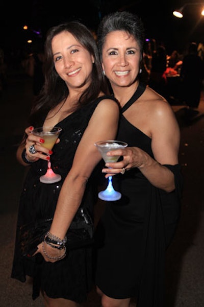 For a $20 donation, guests received a glowing martini glass to replenish with 'zootinis,' the event's specialty cocktail.