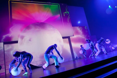 For the closing number, dancers performed with small inflated balls, and then organizers engaged the attendees by passing much larger balls through the audience.