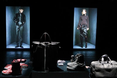 Giant screens at the Kenneth Cole Collection preview showed videos of models in the clothes.