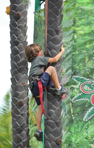A kids' zone featured eco-themed activities, including a palm tree climb.