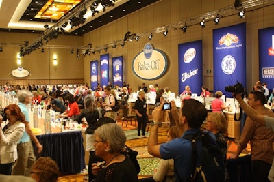 Event organizers and members of the media were allowed onto the contest floor, while the contestants' family and friends watched from the perimeter.