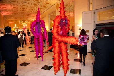 Performers on stilts from Cirque-tacular Entertainment wandered throughout the party.