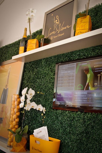 Guests could watch the matches from inside the lounge, decorated throughout with Veuve Clicqout's signature shade of yellow.