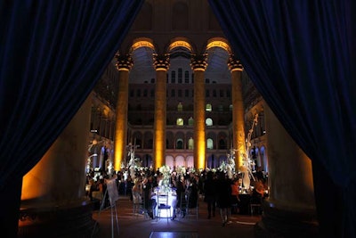 Dark blue drapes separated the reception area from the dinner tables.