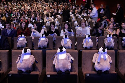 Each seat in the Starr Theater was occupied by a stuffed toy penguin, which, during rehearsals, formed a rather daunting audience. The guests took the plush items home along with branded gray blankets.
