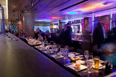 The evening began with a five-course dinner at E11ven for V.I.P.s. After the meal, the guests moved next door to Real Sports Bar and Grill, treading on a 'Walk of Fame'-style path dotted with their names.