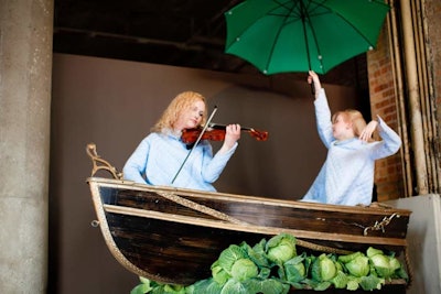 One of the company's so-called 'active site installations' had a duo in a boat surrounded by cabbages.