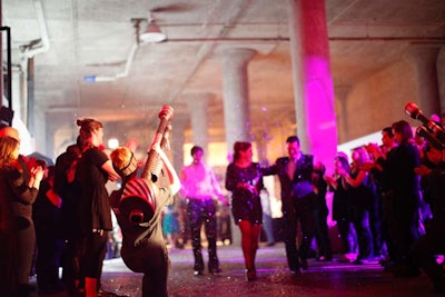 As guests entered the Hudson, which was bathed in low, colorful lights, they walked past two receiving lines of performers.