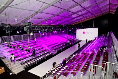 The main runway space is larger this year, with an additional 200 seats, bringing the total capacity up to 900. A versatile screen serves as a backdrop for the 100-foot catwalk.