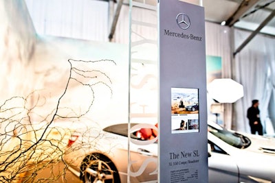 Guests could flip through images from the Lara Stone collaboration on a touch-screen tablet next to the car.