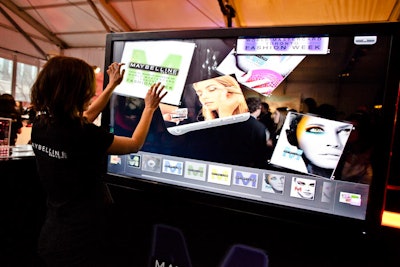 At the Maybelline activation, guests can explore images and videos on a touch screen.