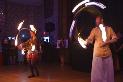 Artists performed with LED lights and flaming Hula-Hoops on the dance floor.
