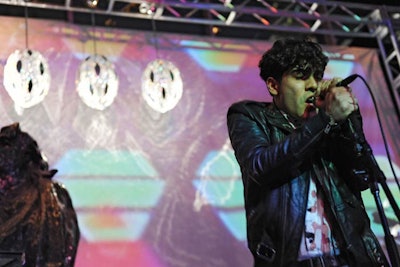 Harrison & Shriftman's production arm, Studio HS, installed chandeliers from Waterford's new interiors collection on the stage. The Luminescence Pendant crystal pieces, which are inspired by Faberge eggs, stood against the backdrop where Neon Indian performed.