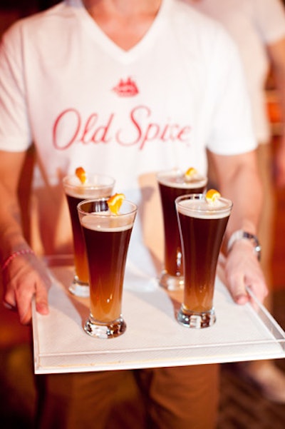 Much like the decor, the menu for the evening was designed to feel manly, with drinks like scotch whiskey with anise maple syrup and lemon juice, topped with dark ale and an orange slice. Passed snacks included buffalo chicken bites and barbecued brisket sliders.