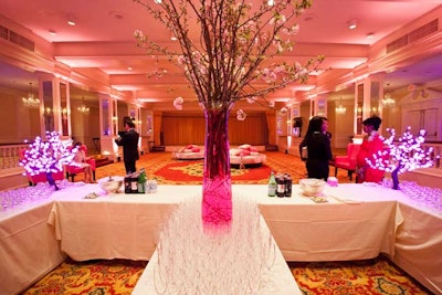 Miniature cherry blossom and illuminated pink trees decorated the bars.