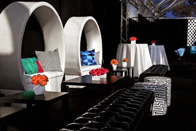 On the first of two nights of parties, black and white decor included pops of color, plus checkered accents.