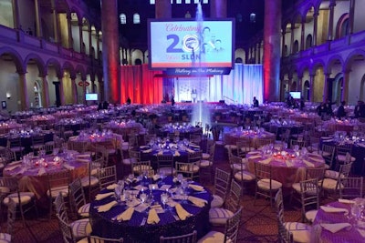 Hargrove and Windows Catering Company alternated red and blue linens on the tables, all surrounded by silver chairs.