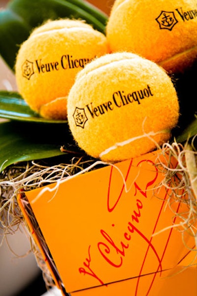 Veuve Cliquout tennis balls served as accents throughout the space.