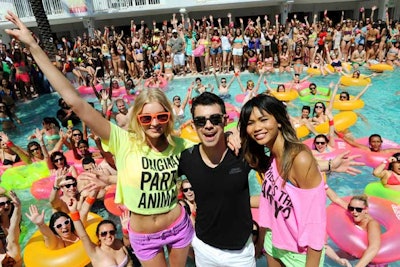Joe Jonas and Victoria’s Secret models Chanel Iman and Elsa Hosk served as celebrity hosts of the 800-person Victoria's Secret Pink pool party.