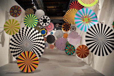 One of the show's exhibits was comprised of colorful patterned wheels that spun for a dramatic, pinwheel effect.